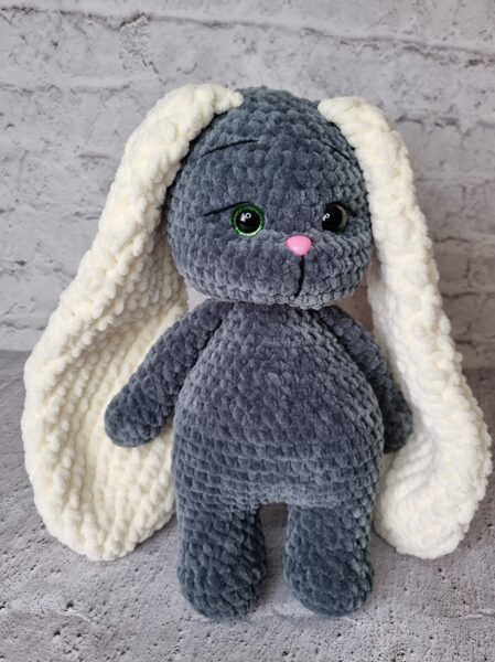 Grey rabbit with white ears